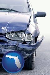 fl map icon and an automobile accident, hopefully covered by insurance